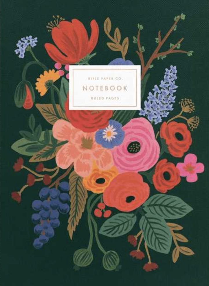 A green floral notebook cover from Rifle Paper Co.