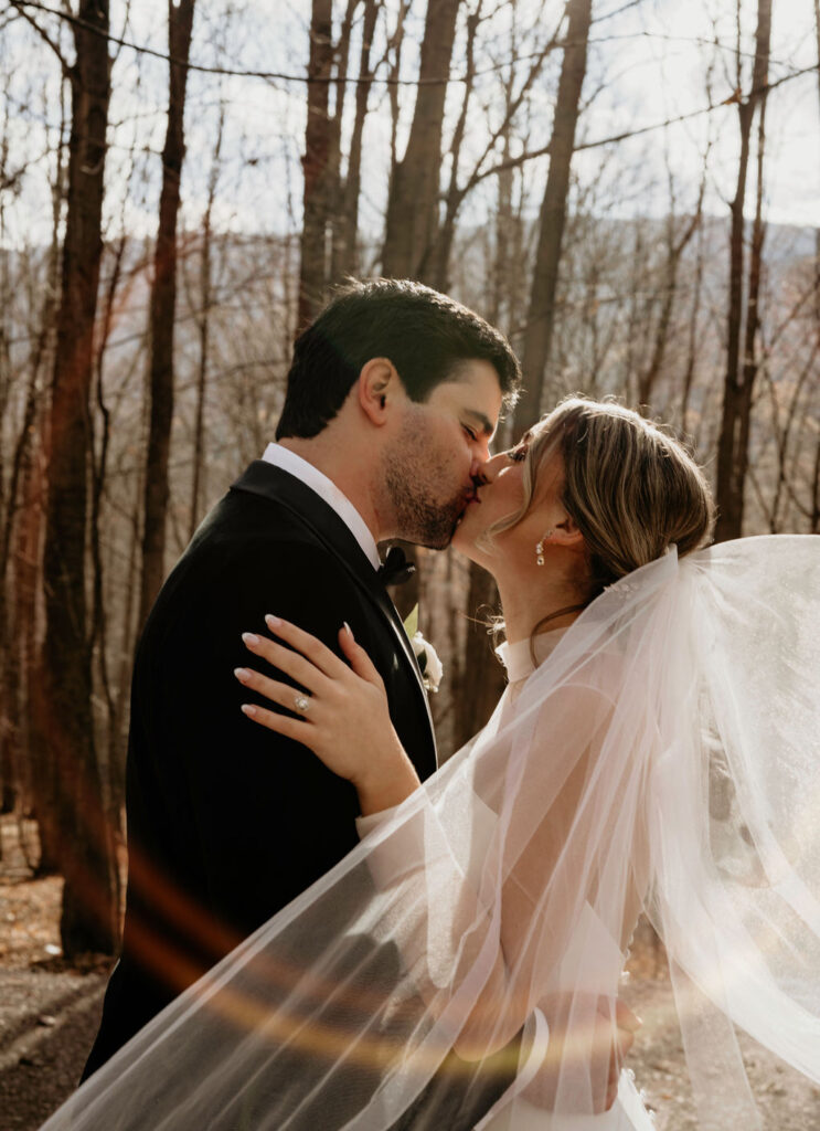 Private forest vow exchange at modern romantic Catskills wedding